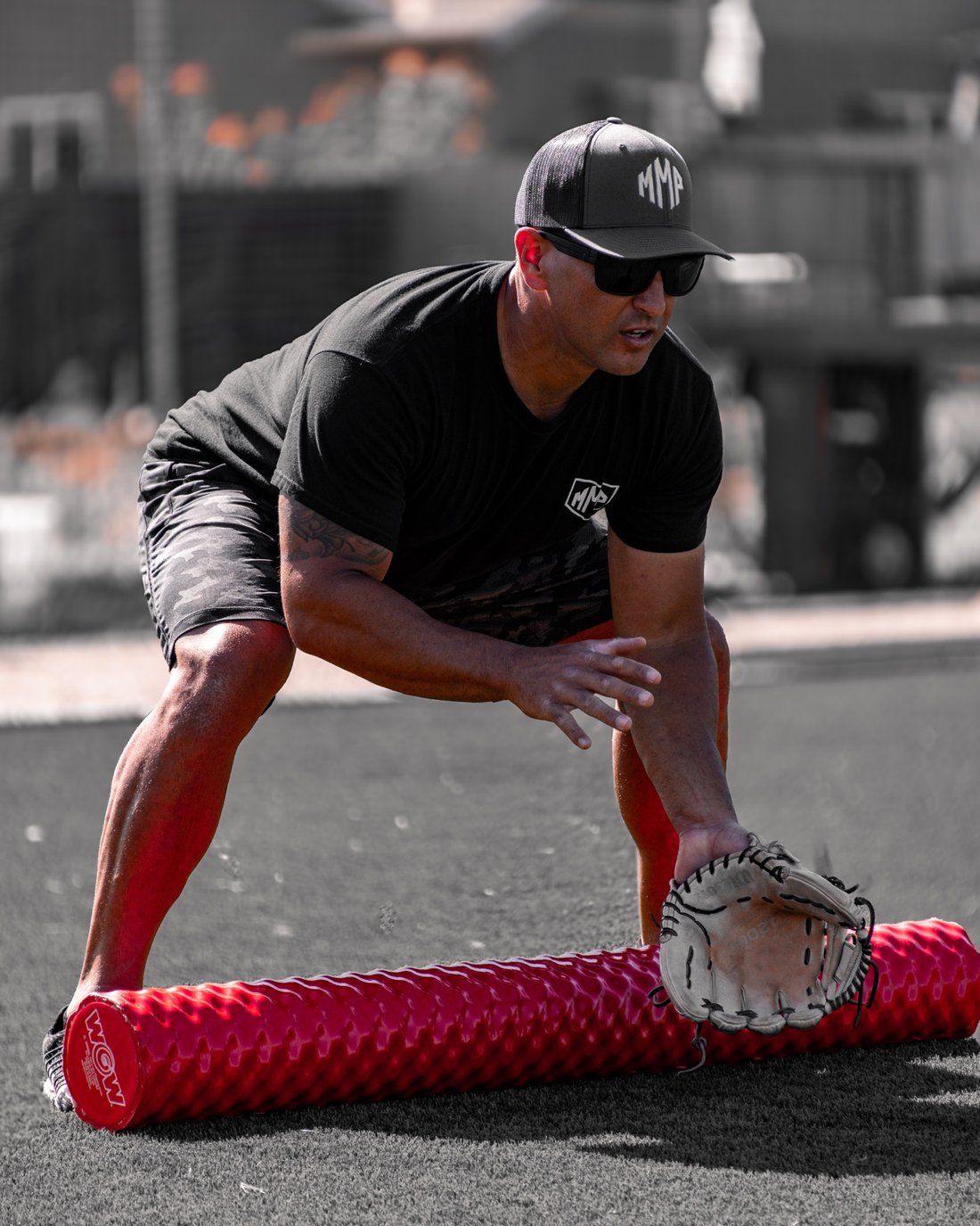 Coach Scott Mead running a fielding drill